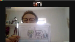 A zoom screenshot showing artist Josh Brown holding up is work to show Anne-Marie