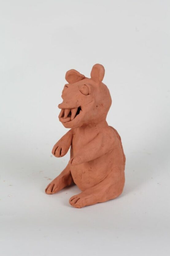 A ceramic weasel created by Dominic Bennett, as part of his Army of Weasels