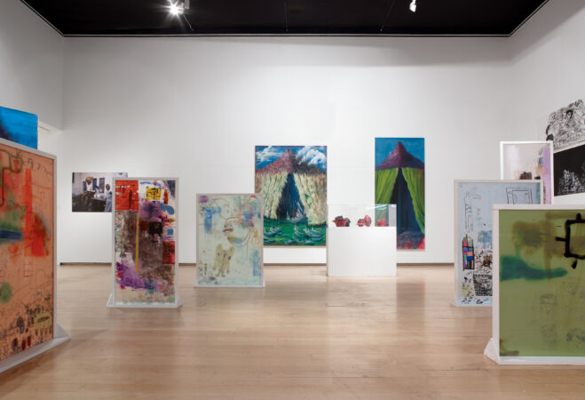 Mixture of freestanding and wall mounted large artworks in large room, at Narratives exhibition at the Lowry gallery