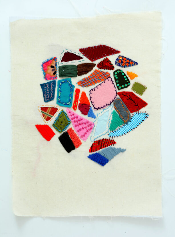 Colourful textile art with different appliqued and embroidered shapes, created by Michael Nash