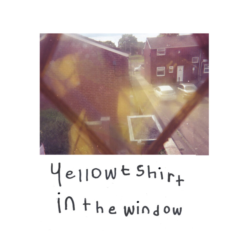 Yellow t shirt in the window image