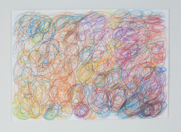 Abstract artwork made using watercolour pencils in a circular motion, multicoloured