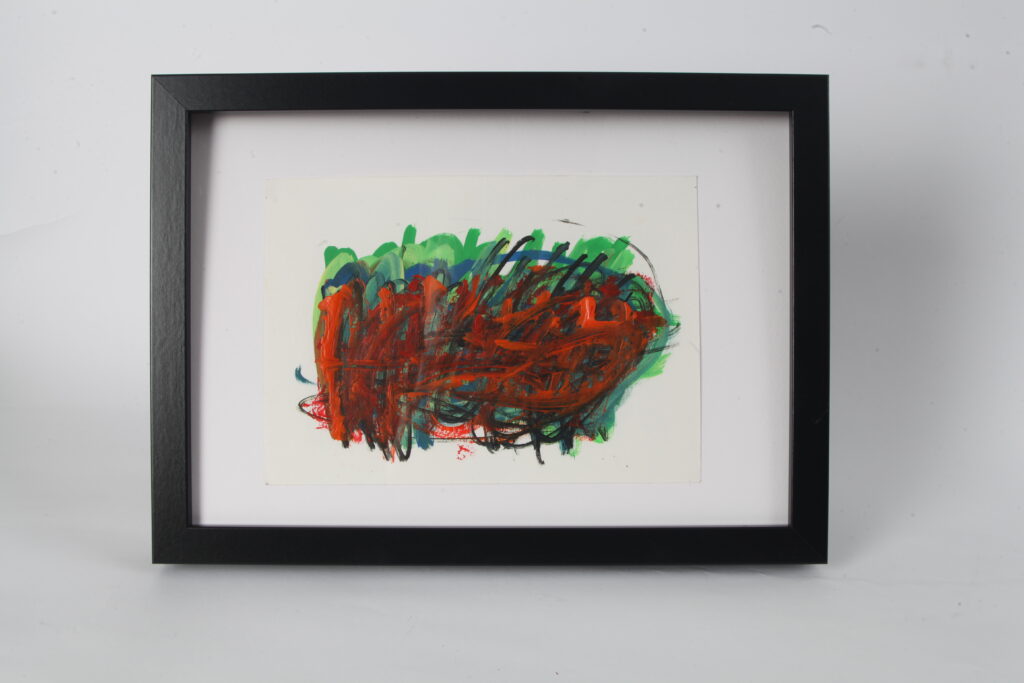 Abstract artwork in orange, green and black, on white background in black frame