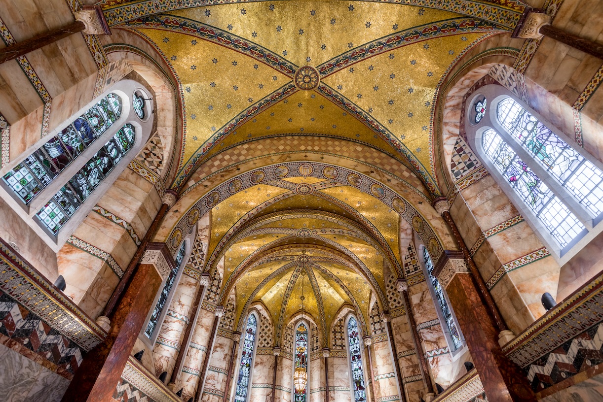 The gold ceiling and windows of Fitzroivia chapel.