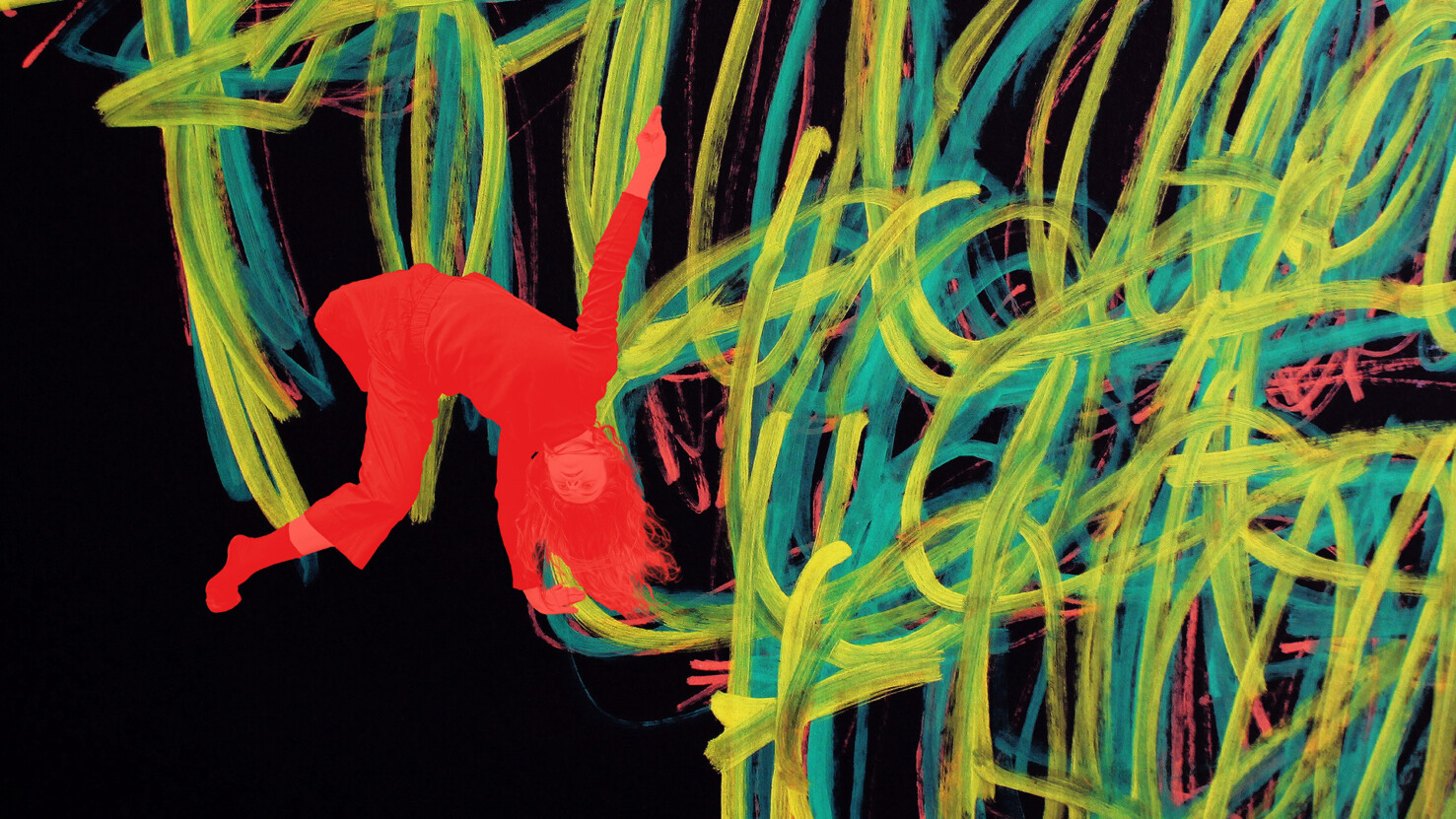 Abstract art of yellow, blue and red lines against a black background, with a figure of a person dancing in red.