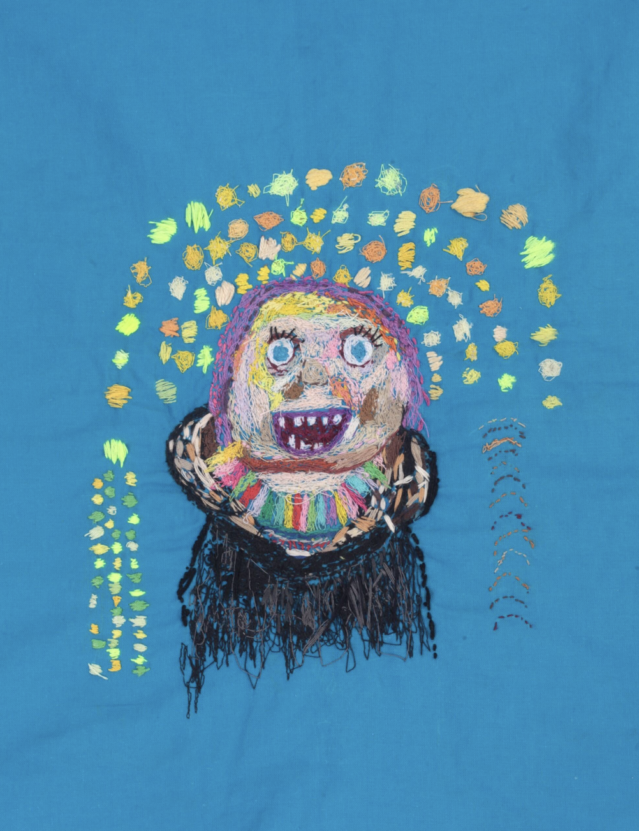 A hand and machine embroidered artwork by Chloe, a studio artist at Venture Arts. The picture is of a lady wearing black dress with a colourful necklace on. Here mouth is open and you can see her teeth and she has bright blue eyes and lilac coloured hair. The picture is on a blue background and there is an arc of differently coloured neon shapes around her.